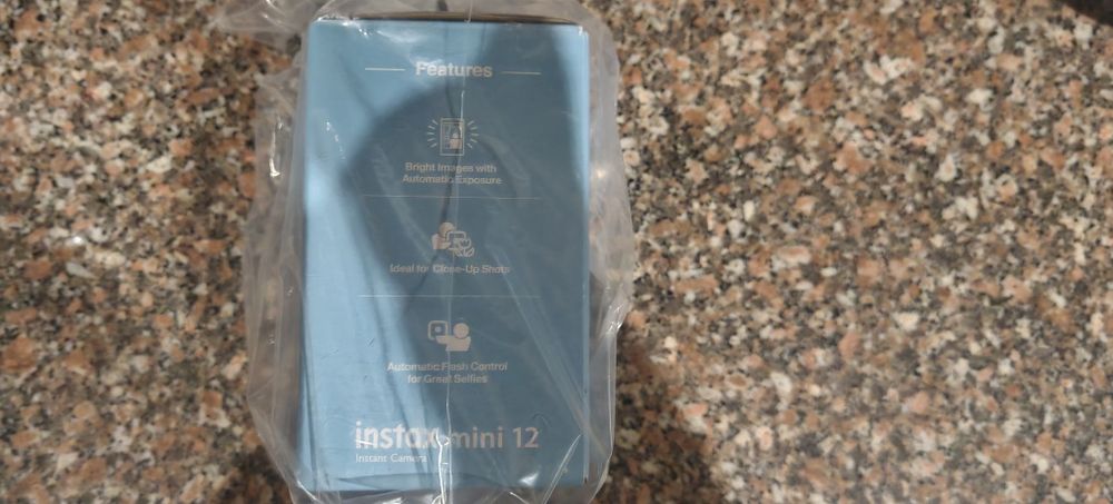 Câmera fotográfica instax mini 12 nova