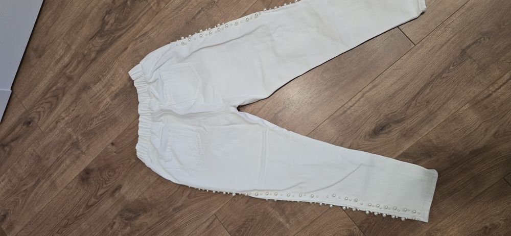 Укорочені  білі штани на S