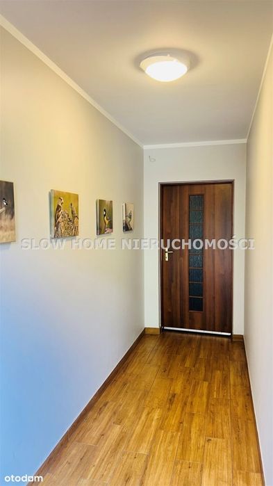 Apartament z garażem oraz biurem z ogródkiem