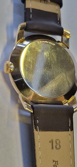 Złoty zegarek Longines próba 585