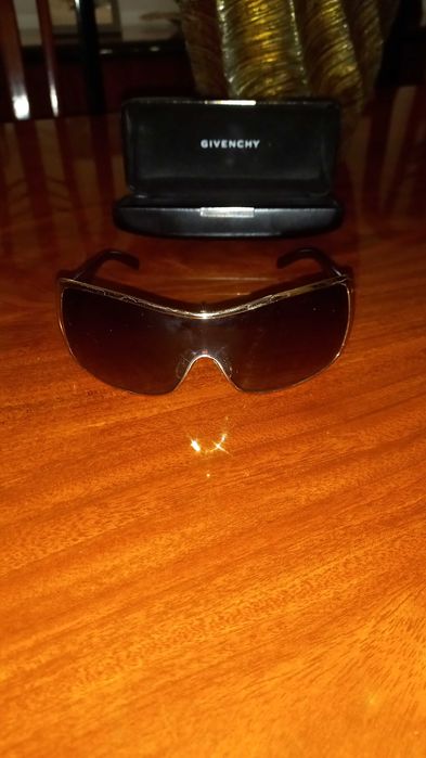 Oculos Givenchy dourados