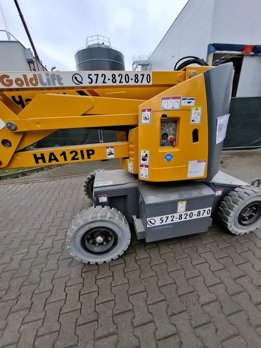 Haulotte HA12IP  Podnośnik elektryczny, przegub, zwyżka, bocian