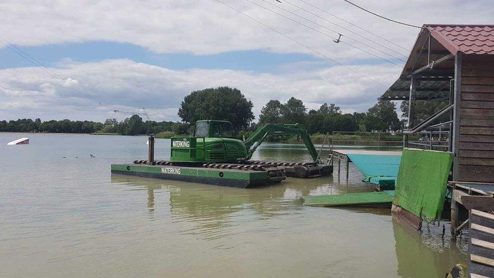 Плавающий экскаватор Амфибия .Очистка от ила, камыша, мусора, деревьев