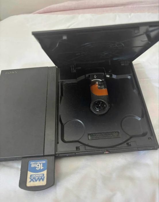 Playstaion 2 com jogos e 2 comandos