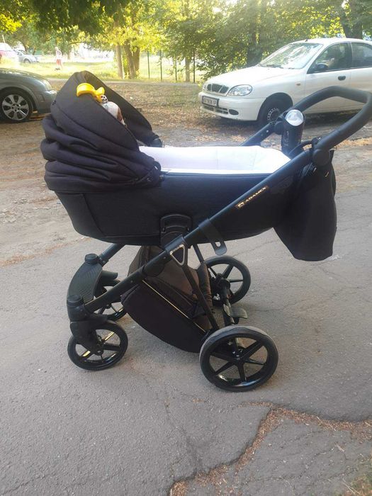 Детская коляска..