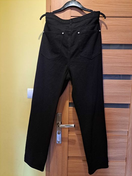 Spodnie jeans r. 46 z dziurami