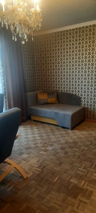 Sofa młodzieżowa jednoosobowa ,rozkładana z pojemnikiem .