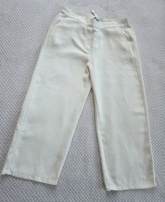 Nowe śmietankowe spodnie damskie kuloty 7/8 wysoki stan gumka w pasie