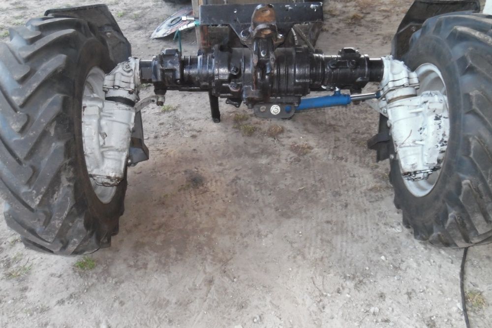 Передний ведучий мост на МТЗ-82 старого и нового образца,балочный
