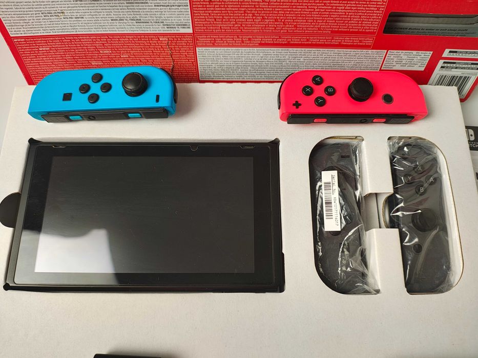 Konsola Nintendo Switch + etui + Super Mario Bross Delux bdb stan