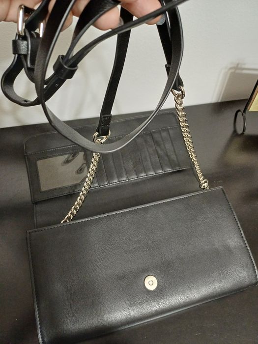 Vendo mala clutch preta com tachas muito moderna