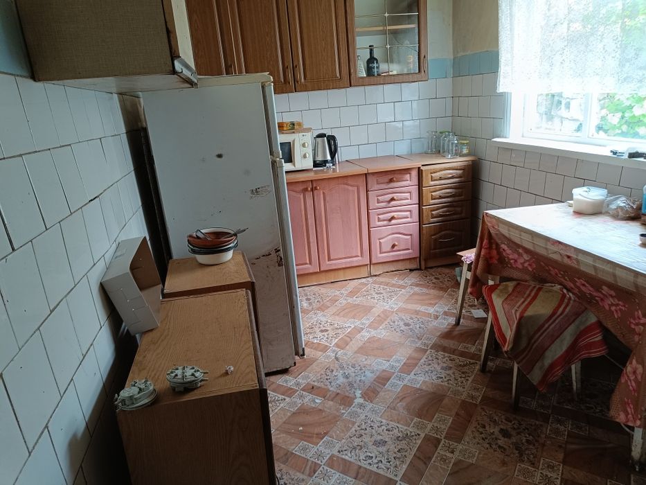 Продам 1/2будинку можна під програми та земельну ділянку 7сот.в Броварах.
