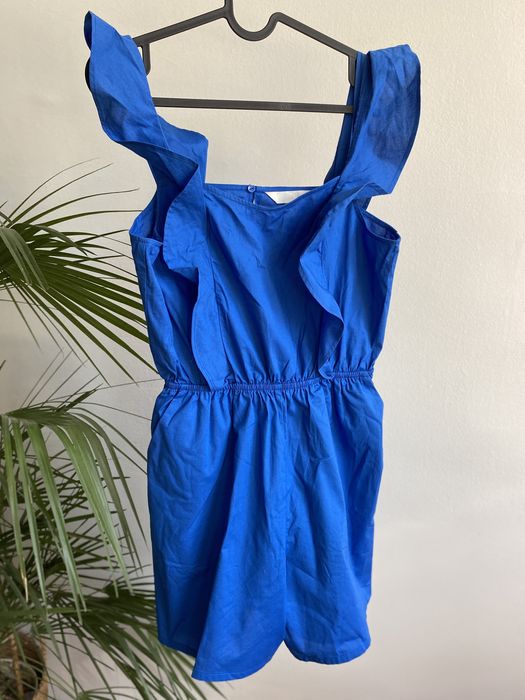 Kombinezon niebieski z falbanami M krótkie spodenki na ramiączkach H&M