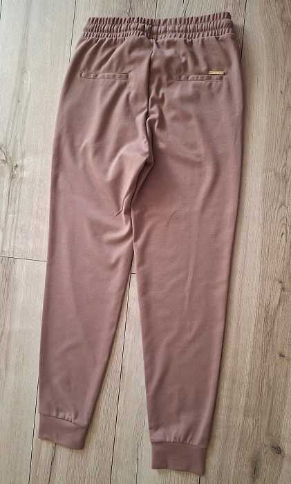 Spodnie Monito wrzos rozm 34 XS sportowe kobiece stan bdb