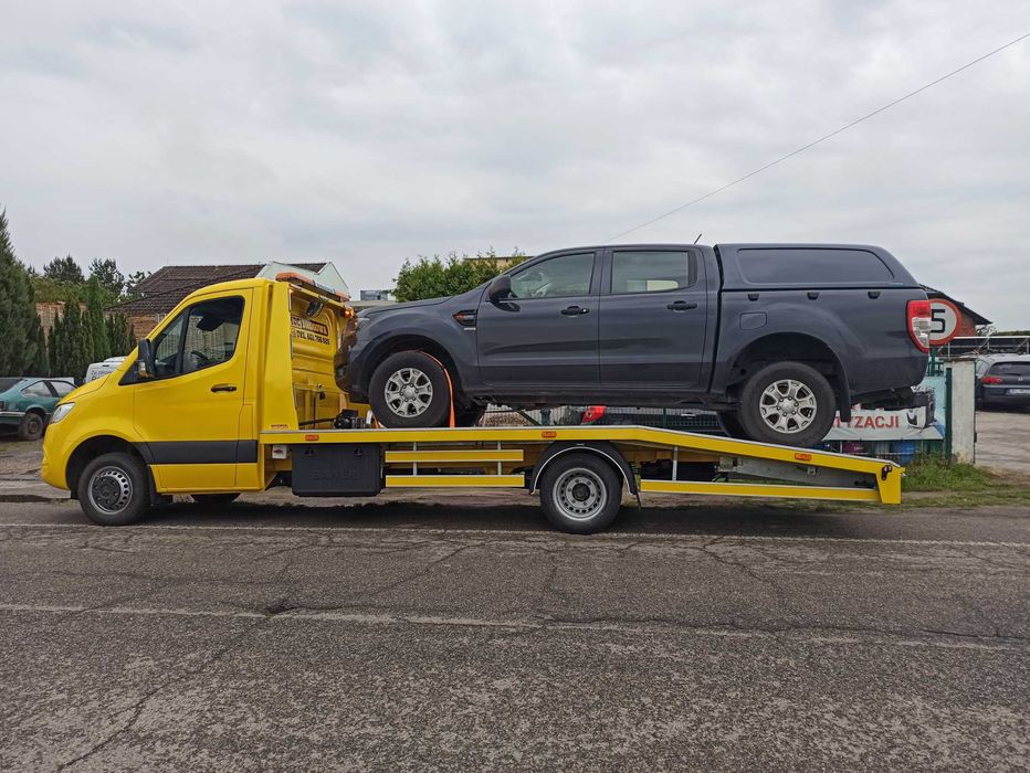 POMOC Drogowa Serwis Laweta Holowanie Auto laweta Usługi TRANSPORTOWE
