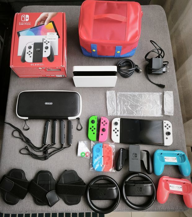 Nintendo Switch OLED branca DESBLOQUEADA — pack completo + imensos acessórios + muitos jogos
