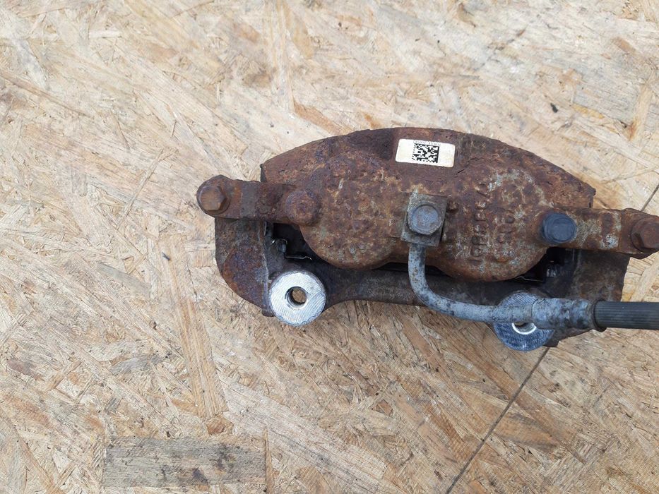 Zacisk Chrysler Grand Voyager 11-21r Dodge Caravan RT RH