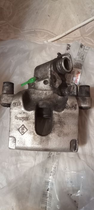 Супорти задні авт. ручника Лагуна 3