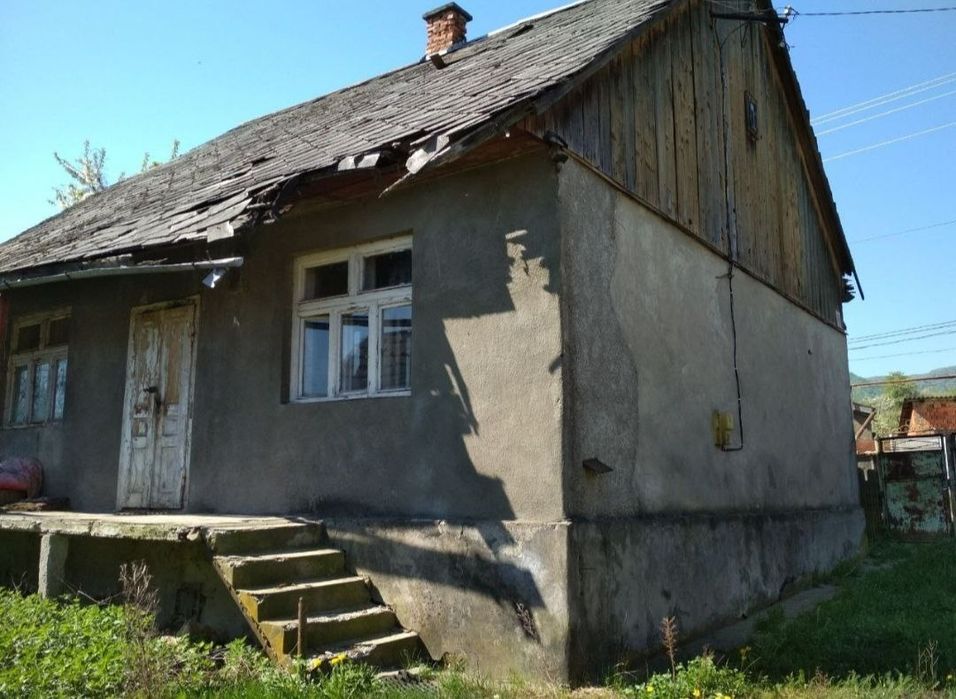 Продам земельну ділянку з будинком