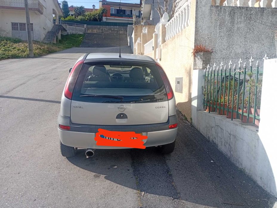 Opel Corsa  2 portas a gasolina em muito bom estado.. Contato 914980046