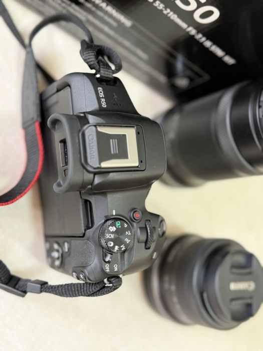 Canon R50 + objetiva 18-45mm + objetiva 55-210 + carregador