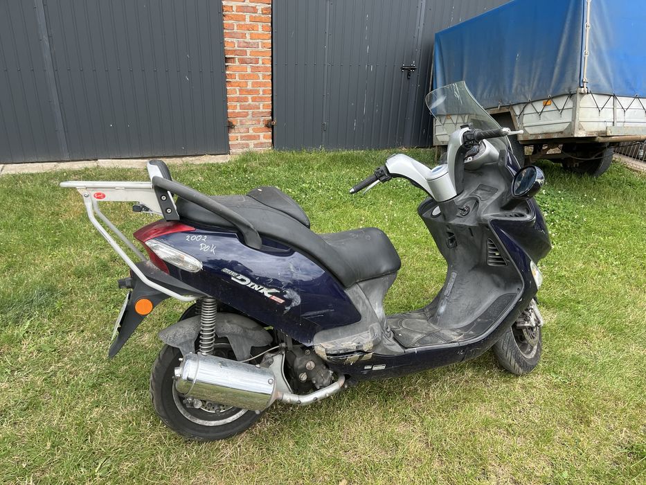 Kymco Grand Dink 125 na części czasza osłony gaźnik lusterka płozy