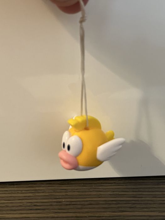 Boneco “Eep Cheep” (Super Mário)