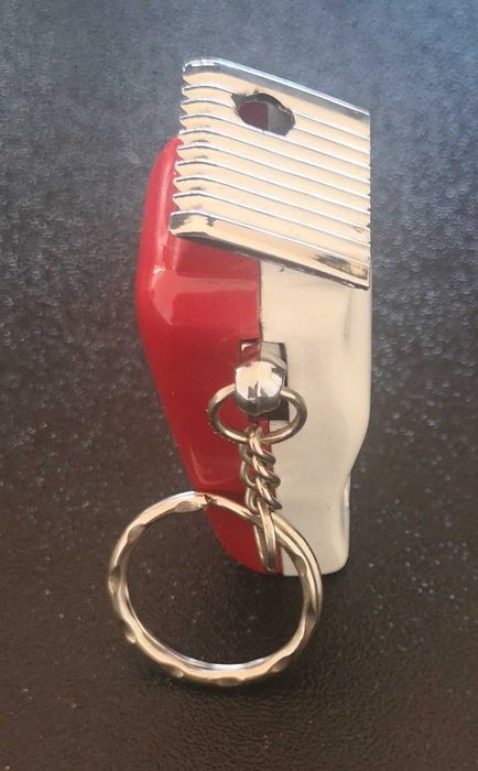 Isqueiro a gás com formato a máquina de barbear