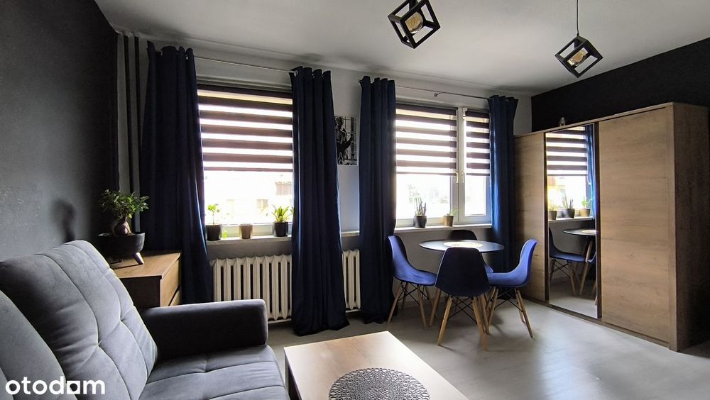 przytulny pokój z kuchnią