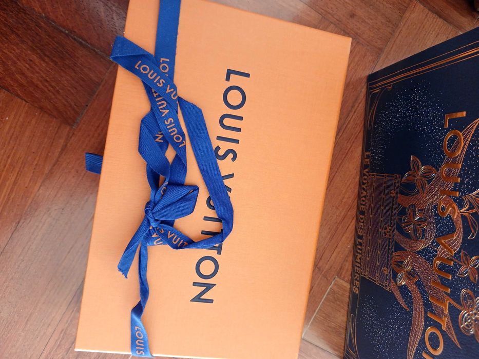Pochette Louis Vuitton autêntica com talão de compra