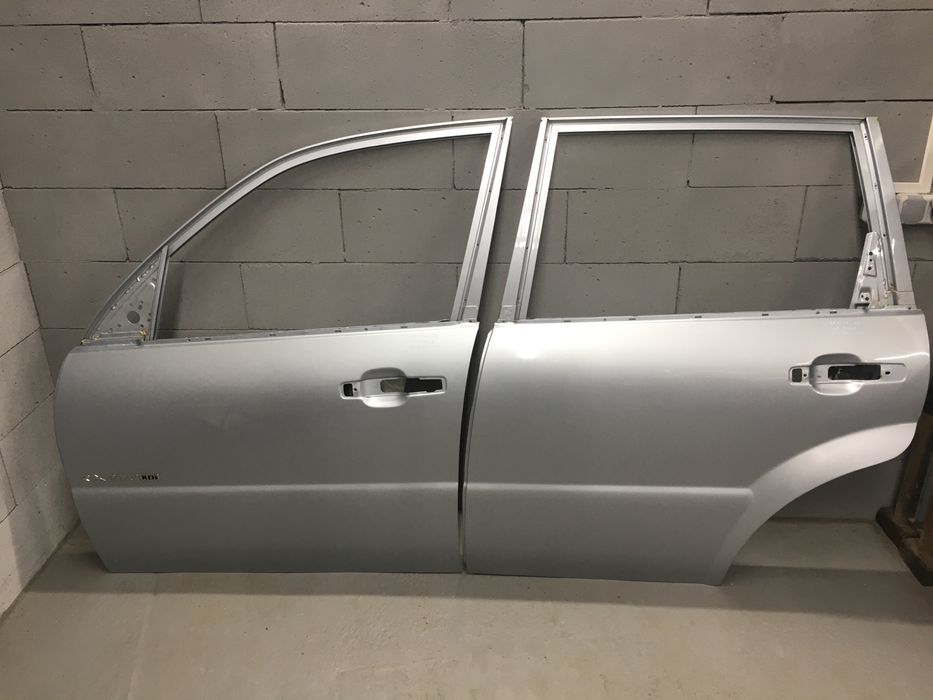 Дверь передняя задняя левая правая Ssang Yong Rexton Рекстон запчасти