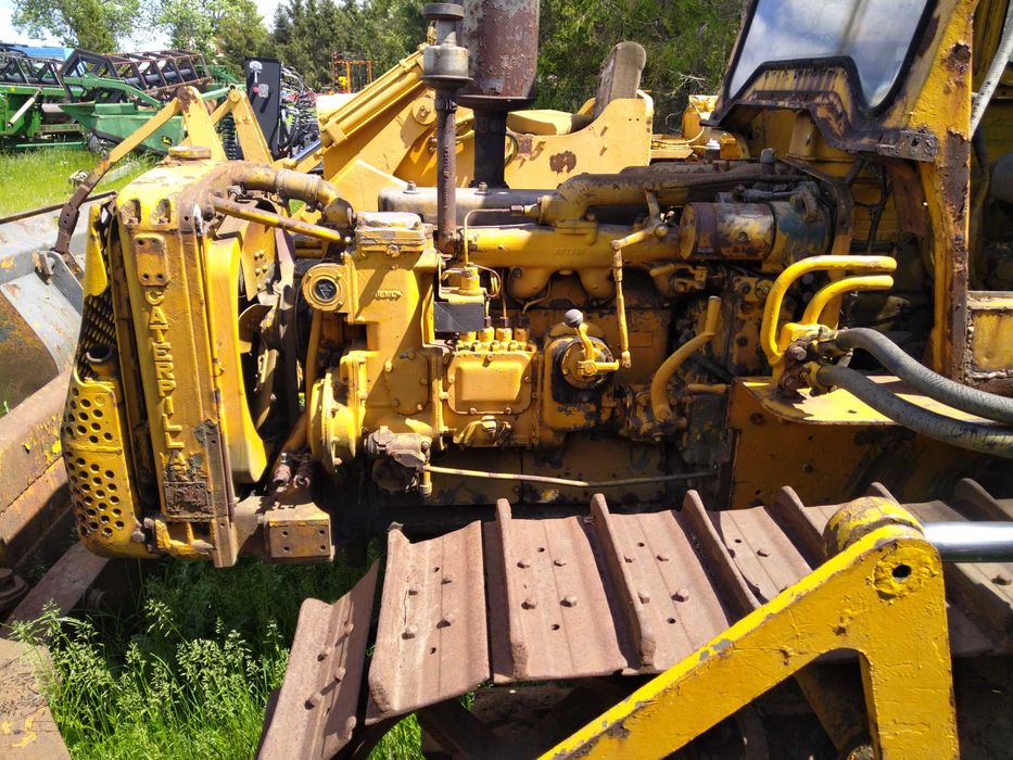 Spycharka Caterpillar D4