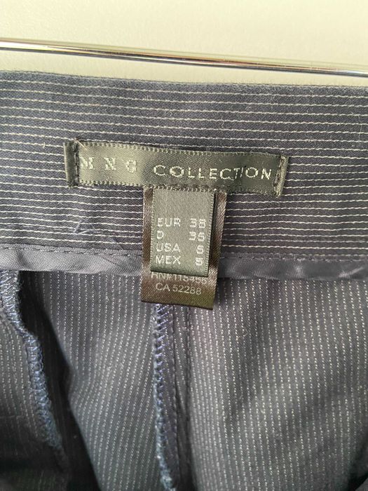 Fato com saia e calças Mango