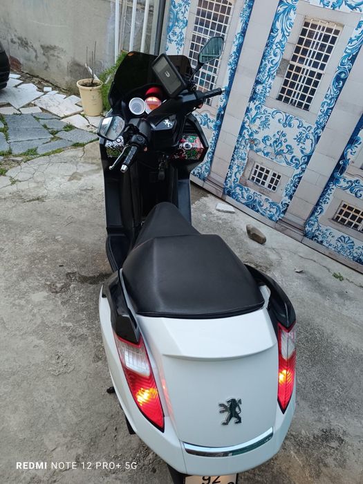 Pegeot satelis 125