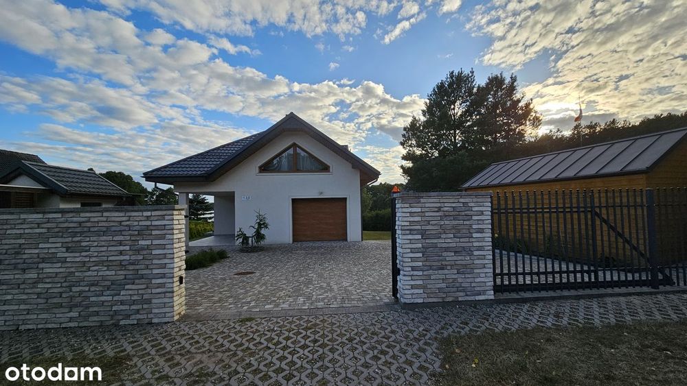 sprzedam komfortowy dom z pięknym widokiem na jezioro
