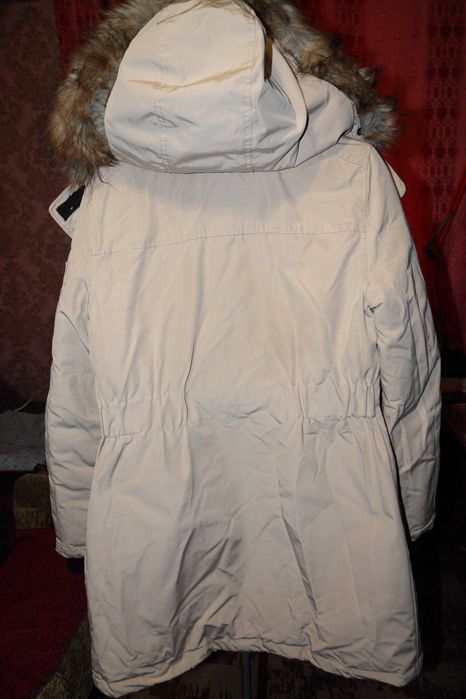 Куртку женскую, теплую