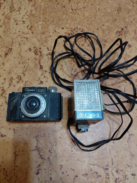 Фотоаппарат и фотовспышка