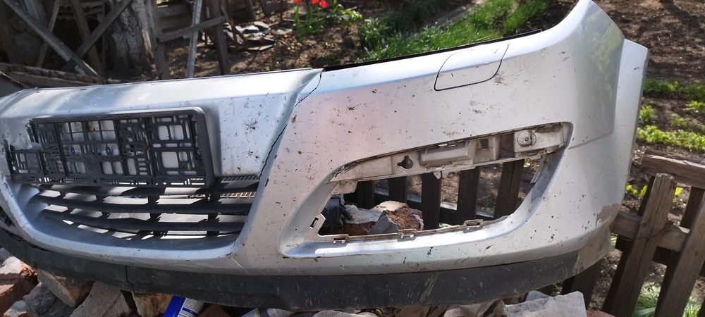 Бампер Опель Астра Н битый