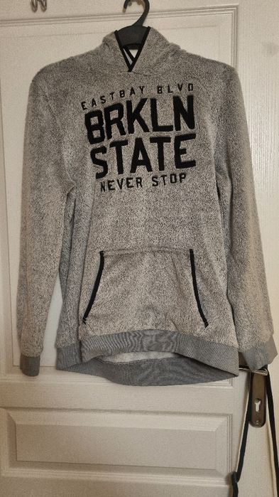 Milutka w dotyku i ciepła bluza z kapturem C&A