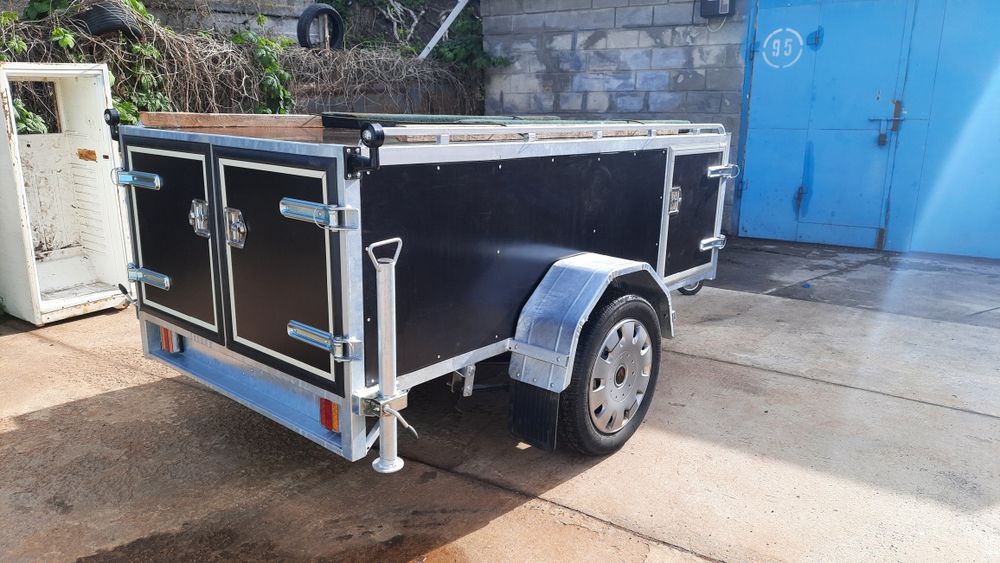 Прицеп , причіп для перевозки собак.