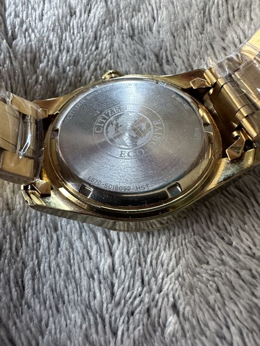 Citizen Men's 'Calibre 8700' Goldtone Eco-Drive Watch Model: BL8002-59Aз