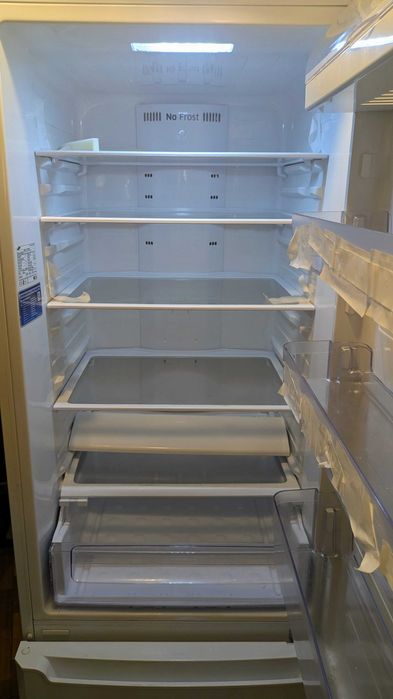 Холодильник з морозильною камерою Samsung RL48RLBSW