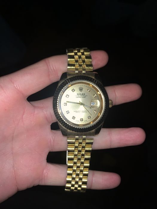 Часы Rolex.