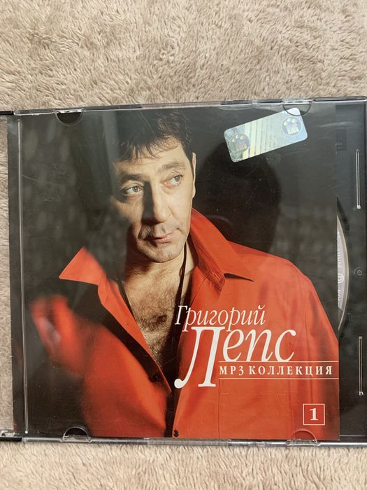 Диски (CD, DVD) тематичні, музичні, аудіо книги