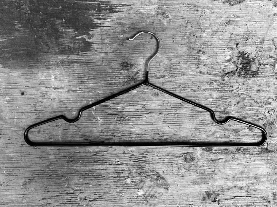 Тримач для одягу