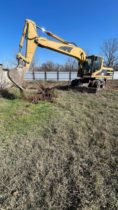 Услуги экскаватора и самосвалов