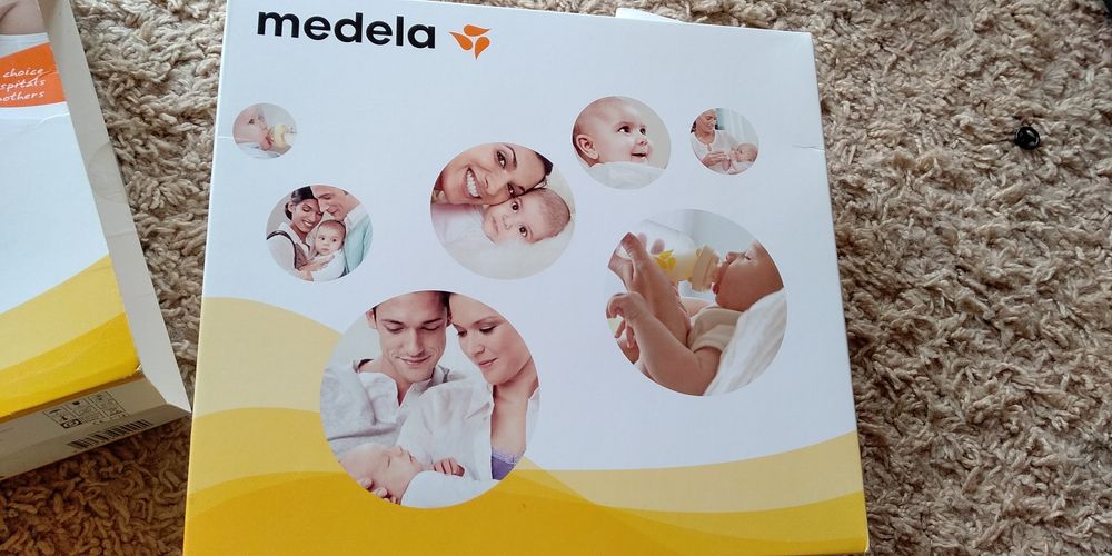 Молокоотсос MEDELA электрический