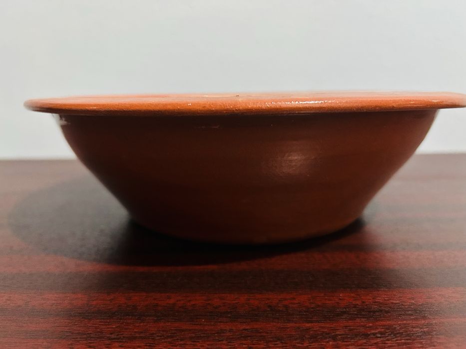 Hand-painted clay bowl430225374504570882
