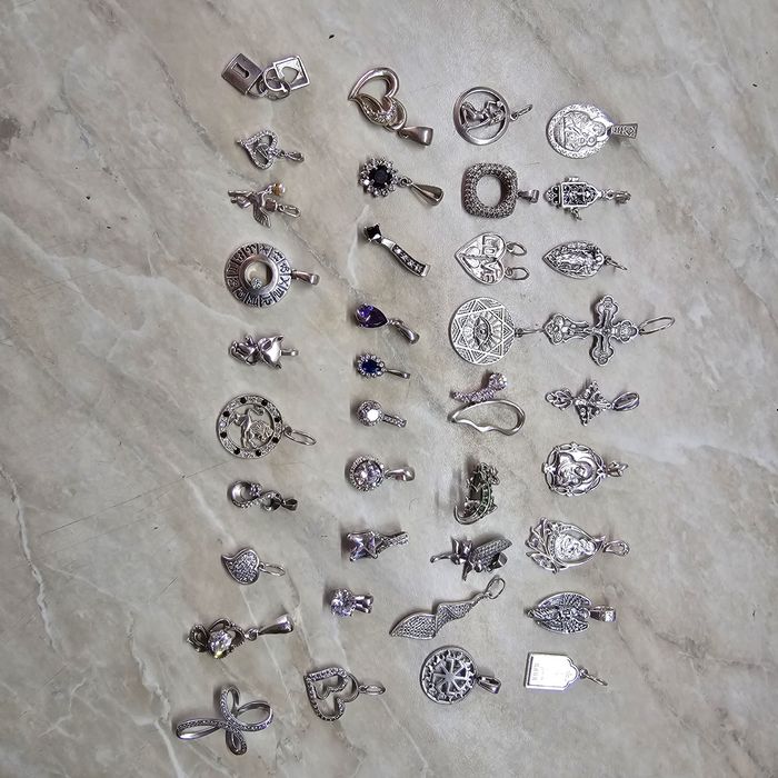 Серебрянные кулоны,крестики