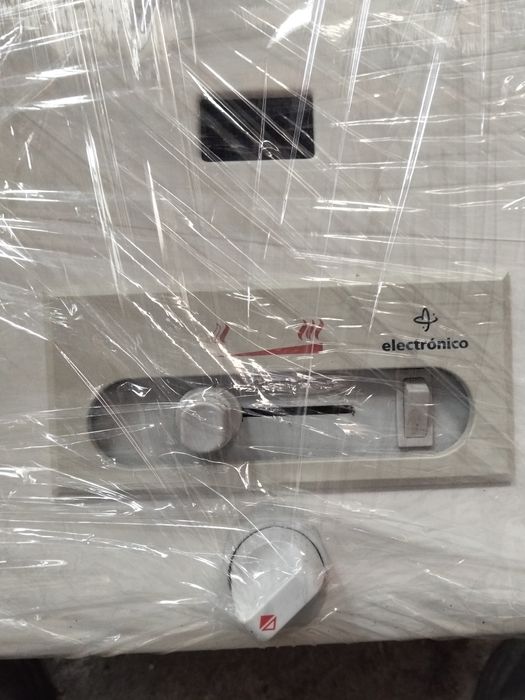 Esquentador Vulcano 11 LT usado.